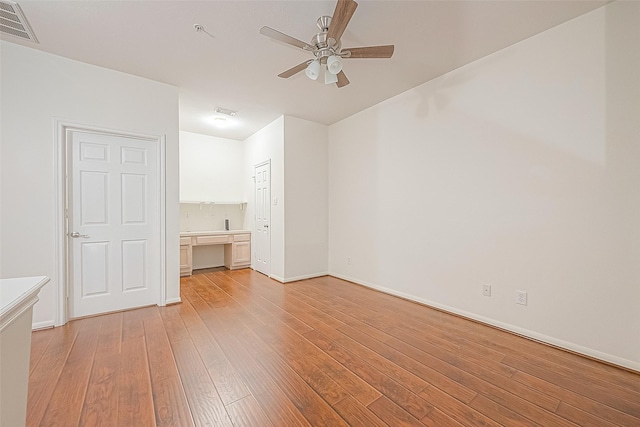 2710 Grants Lake Blvd Unit T6, Sugar Land, TX 77479 - unfurnished room with a ceiling fan, light wood-style flooring, and built in desk