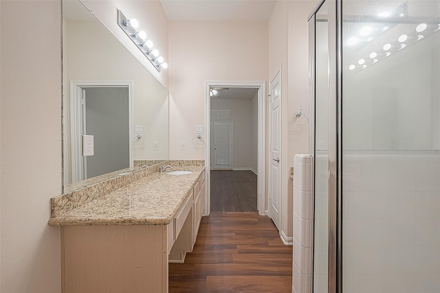 2710 Grants Lake Blvd Unit T6, Sugar Land, TX 77479 - full bath with wood finished floors, vanity, and a shower with door