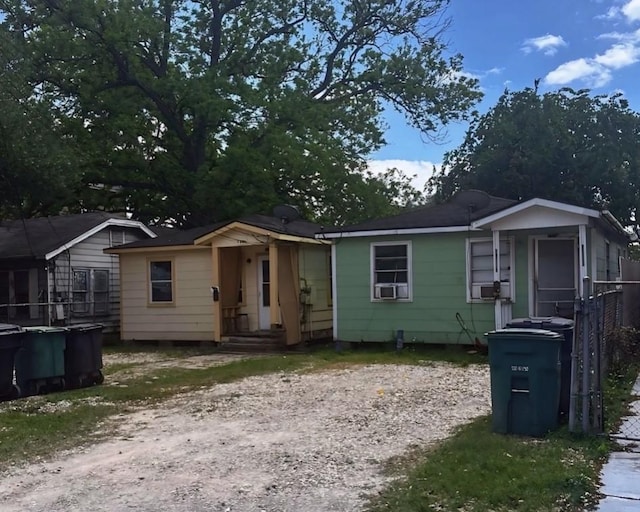 1204 Johnston St, Houston, TX 77022 - view of front of home featuring cooling unit