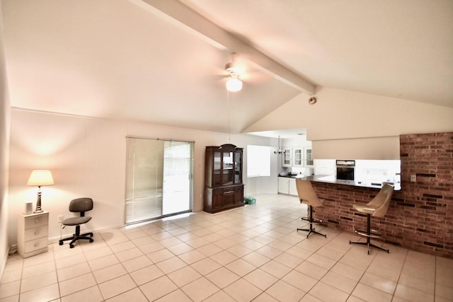 11931 Tanager St, Houston, TX 77072 - living room with ceiling fan, beam ceiling, light tile patterned floors, and high vaulted ceiling