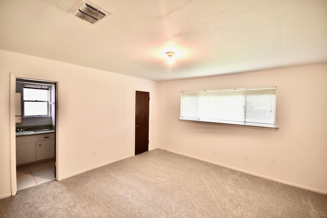 11931 Tanager St, Houston, TX 77072 - empty room with carpet flooring and baseboards