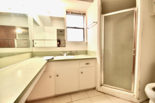 11931 Tanager St, Houston, TX 77072 - full bathroom with vanity, a stall shower, and tile patterned floors