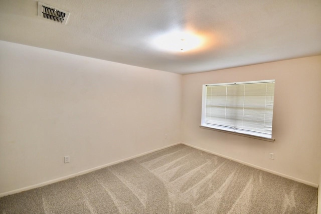 11931 Tanager St, Houston, TX 77072 - carpeted empty room featuring baseboards