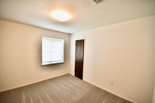 11931 Tanager St, Houston, TX 77072 - carpeted empty room with baseboards