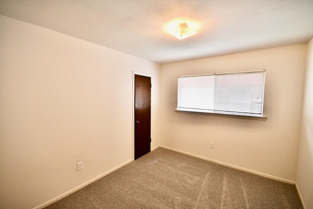 11931 Tanager St, Houston, TX 77072 - spare room with carpet and baseboards