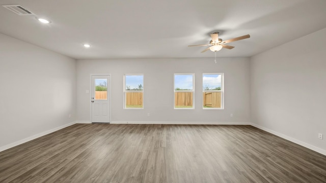 25021 Pomegranate Pl, Montgomery, TX 77316 - unfurnished room featuring ceiling fan, wood finished floors, and recessed lighting