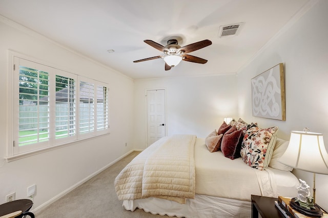 918 N Wilcrest Dr, Houston, TX 77079 - carpeted bedroom featuring crown molding and a ceiling fan