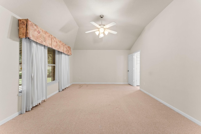 24910 Corbin Gate Dr, Spring, TX 77389 - spare room featuring light colored carpet, vaulted ceiling, and ceiling fan