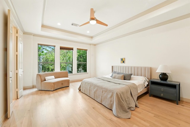 4106 Lehigh Ave, Houston, TX 77005 - bedroom featuring light wood finished floors, a raised ceiling, recessed lighting, and a ceiling fan