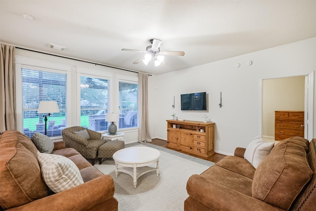 703 Rock Creek Ct, Rosenberg, TX 77469 - living room with a ceiling fan and light wood-type flooring