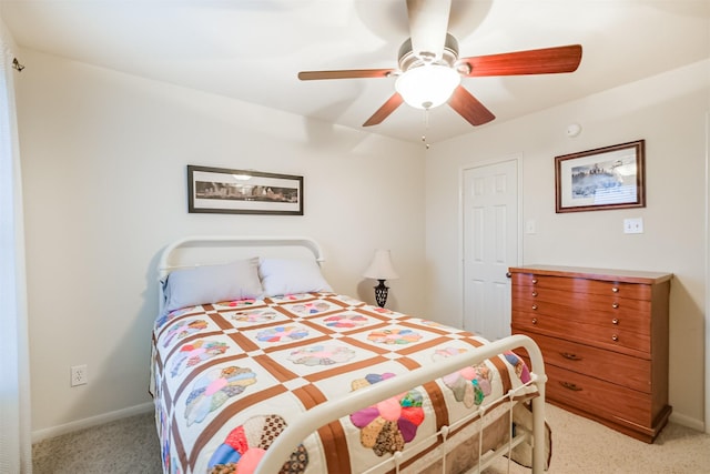 703 Rock Creek Ct, Rosenberg, TX 77469 - bedroom with light colored carpet and a ceiling fan