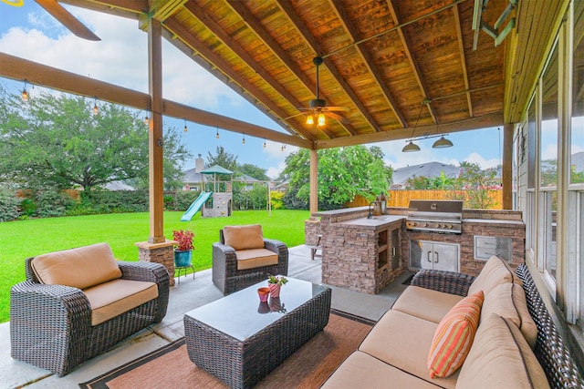 703 Rock Creek Ct, Rosenberg, TX 77469 - view of patio / terrace featuring outdoor lounge area, exterior kitchen, a playground, and ceiling fan
