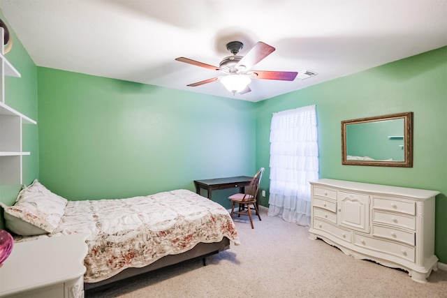 703 Rock Creek Ct, Rosenberg, TX 77469 - bedroom with light colored carpet and a ceiling fan