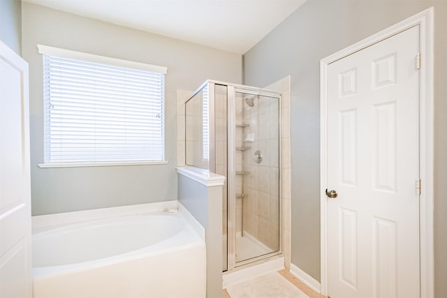 703 Rock Creek Ct, Rosenberg, TX 77469 - full bathroom with a garden tub and a stall shower