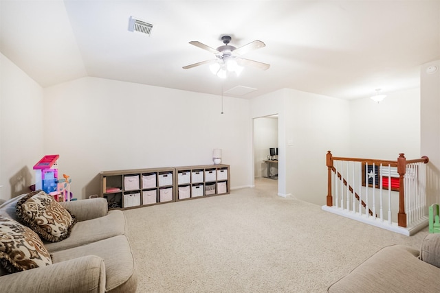 703 Rock Creek Ct, Rosenberg, TX 77469 - living area featuring an upstairs landing, attic access, carpet, ceiling fan, and lofted ceiling