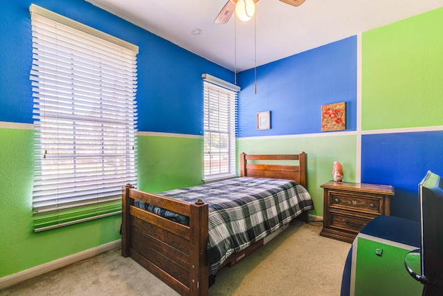 1603 Chart Dr, Crosby, TX 77532 - bedroom featuring carpet floors, a ceiling fan, and a textured wall