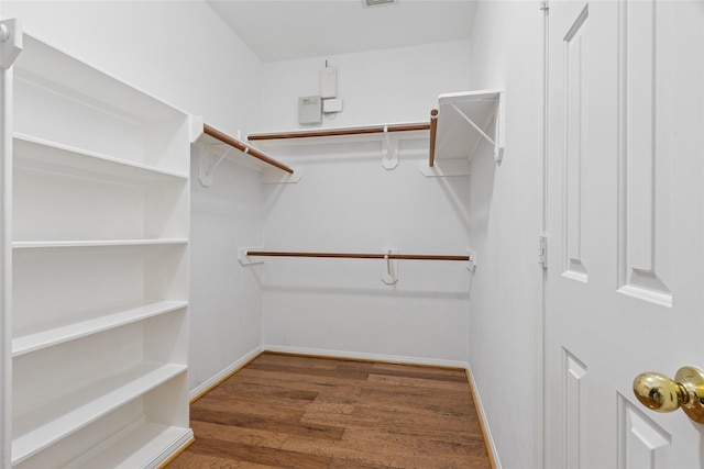 16306 Ancient Forest Dr, Humble, TX 77346 - spacious closet featuring wood finished floors