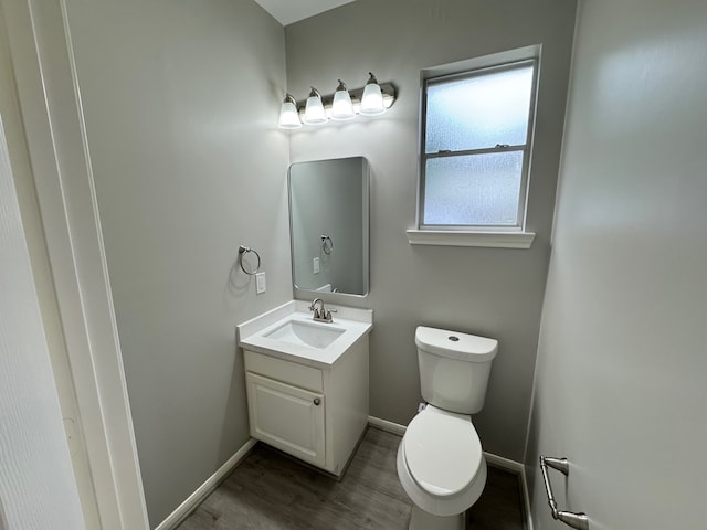 819 Companion Dr, Crosby, TX 77532 - half bath with vanity and wood finished floors