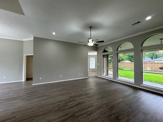 819 Companion Dr, Crosby, TX 77532 - spare room featuring dark wood finished floors, a textured ceiling, ceiling fan, crown molding, and recessed lighting
