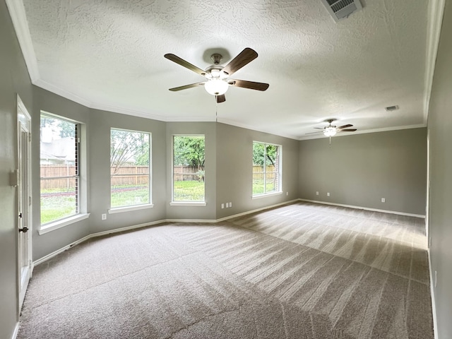 819 Companion Dr, Crosby, TX 77532 - carpeted spare room with a textured ceiling, healthy amount of natural light, ceiling fan, and ornamental molding