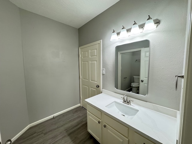 819 Companion Dr, Crosby, TX 77532 - bathroom with wood finished floors and vanity