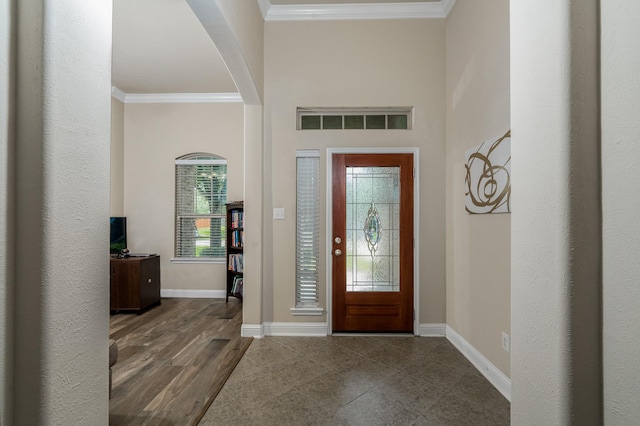 8506 Clarkman Ridge Ln, Cypress, TX 77433 - foyer featuring arched walkways and crown molding