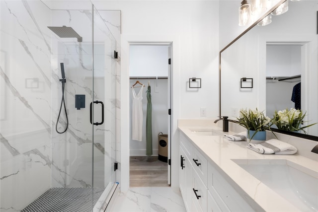 2475 Carmel St A/B, Unit A/B Houston, TX 77091 - bathroom featuring marble look tile flooring, a marble finish shower, and double vanity