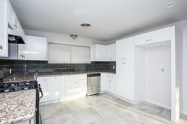 6407 Nuben St, Houston, TX 77091 - kitchen with dishwasher, gas range oven, light stone counters, tasteful backsplash, and white cabinetry