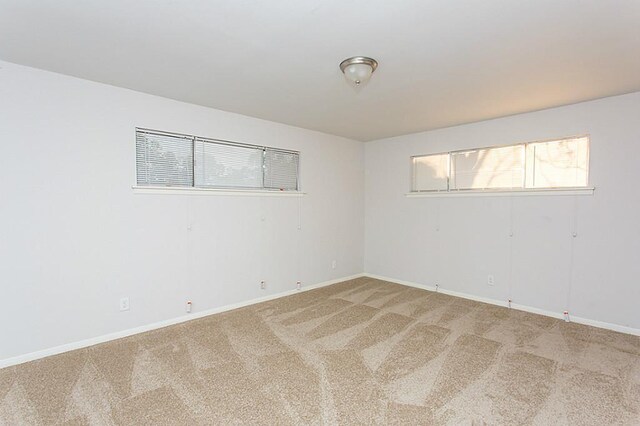 6407 Nuben St, Houston, TX 77091 - unfurnished room featuring light colored carpet and baseboards