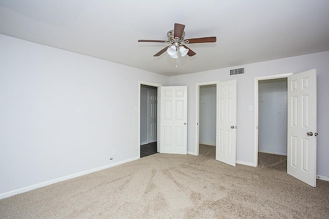 6407 Nuben St, Houston, TX 77091 - unfurnished bedroom featuring carpet flooring, a ceiling fan, and a spacious closet
