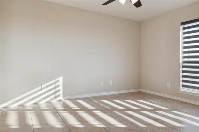 2407 Thuesen Rd, Beasley, TX 77417 - spare room featuring ceiling fan, healthy amount of natural light, and light tile patterned floors
