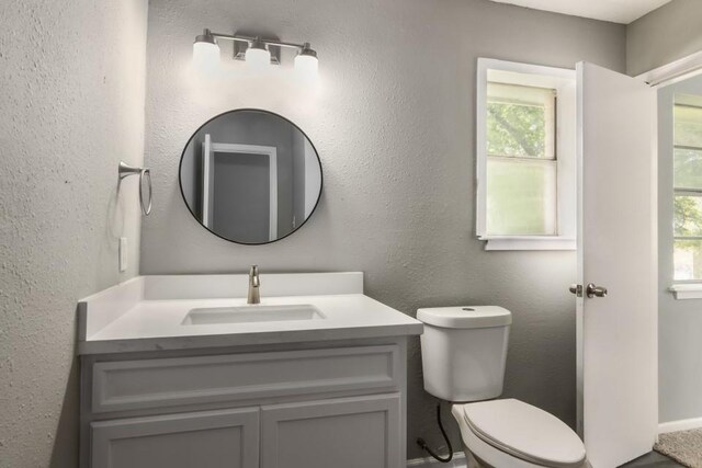 1314 Garrett St, Brenham, TX 77833 - bathroom with vanity and toilet