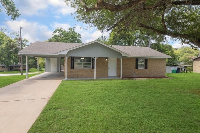 1314 Garrett St, Brenham, TX 77833 - ranch-style home with brick siding, concrete driveway, a front yard, and a carport
