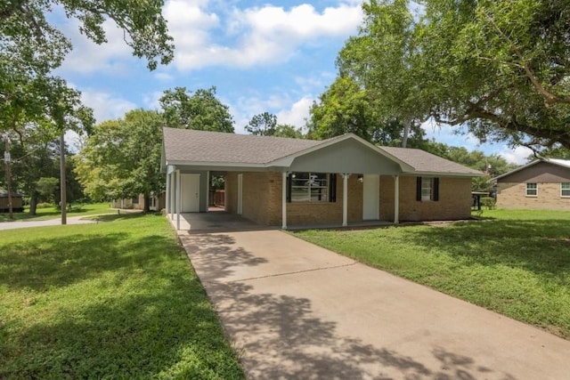 1314 Garrett St, Brenham, TX 77833 - single story home with driveway, a front lawn, an attached carport, and brick siding