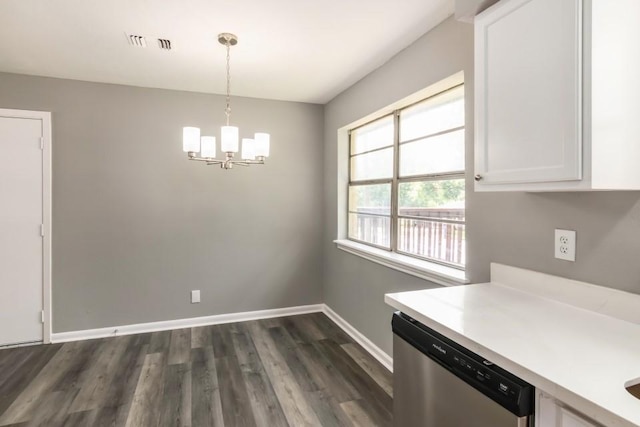 1314 Garrett St, Brenham, TX 77833 - unfurnished dining area with a chandelier and dark wood finished floors