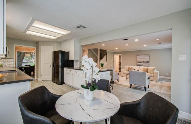 22523 Wildwood Grove Dr, Katy, TX 77450 - dining room with recessed lighting and light wood finished floors