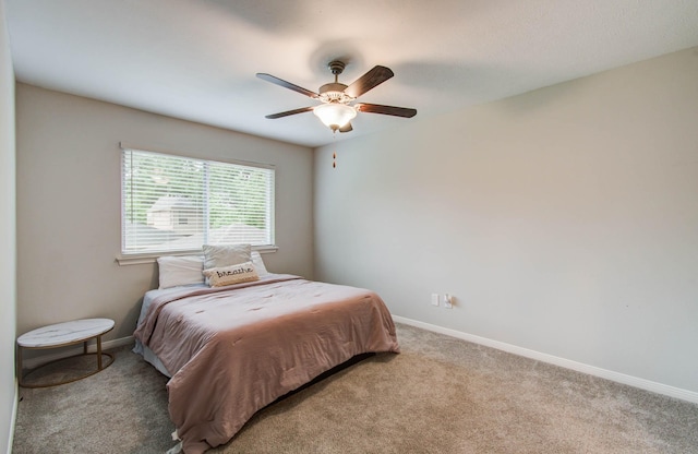 22523 Wildwood Grove Dr, Katy, TX 77450 - carpeted bedroom featuring baseboards and ceiling fan