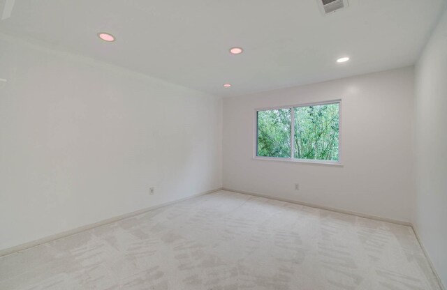 22523 Wildwood Grove Dr, Katy, TX 77450 - unfurnished room featuring light colored carpet and recessed lighting