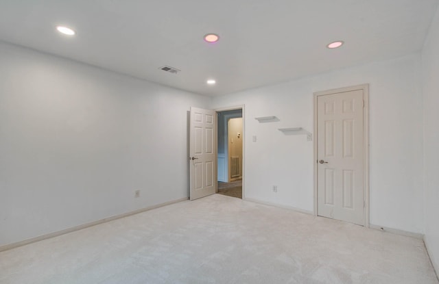 22523 Wildwood Grove Dr, Katy, TX 77450 - unfurnished bedroom featuring recessed lighting and carpet