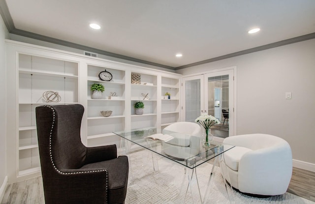 22523 Wildwood Grove Dr, Katy, TX 77450 - living area featuring french doors, wood finished floors, ornamental molding, and recessed lighting