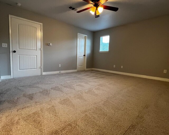 575 Hartman Rd, Silsbee, TX 77656 - carpeted empty room with ceiling fan and a smoke detector