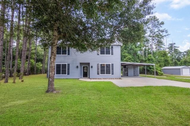 575 Hartman Rd, Silsbee, TX 77656 - view of front of house with driveway, a front yard, and an attached carport