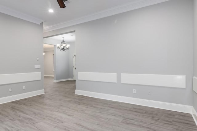 575 Hartman Rd, Silsbee, TX 77656 - spare room featuring ornamental molding, a chandelier, ceiling fan, wood finished floors, and recessed lighting