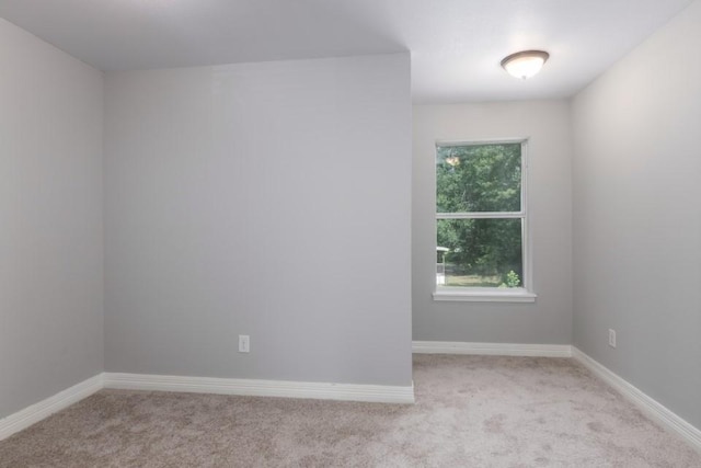 575 Hartman Rd, Silsbee, TX 77656 - spare room featuring light carpet and baseboards
