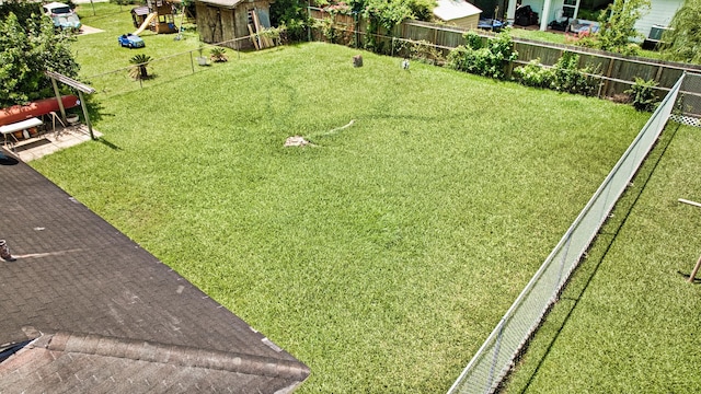 1726 Wilde Rock Way, Houston, TX 77018 - fenced backyard featuring an outbuilding