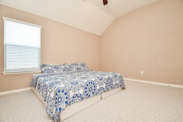 5823 Lundwood Ln, Houston, TX 77084 - carpeted bedroom with vaulted ceiling, multiple windows, and ceiling fan