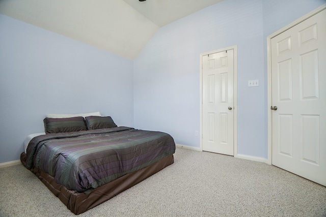 5823 Lundwood Ln, Houston, TX 77084 - carpeted bedroom with vaulted ceiling and baseboards