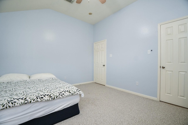 5823 Lundwood Ln, Houston, TX 77084 - bedroom with light colored carpet, lofted ceiling, and a ceiling fan