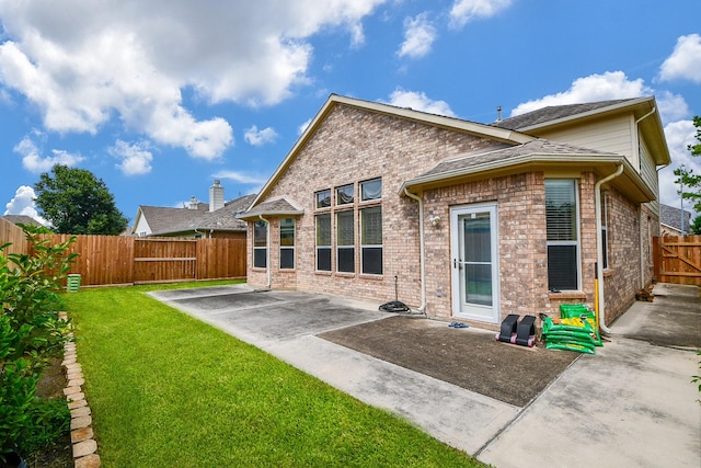 5823 Lundwood Ln, Houston, TX 77084 - rear view of property featuring a patio, a fenced backyard, and brick siding