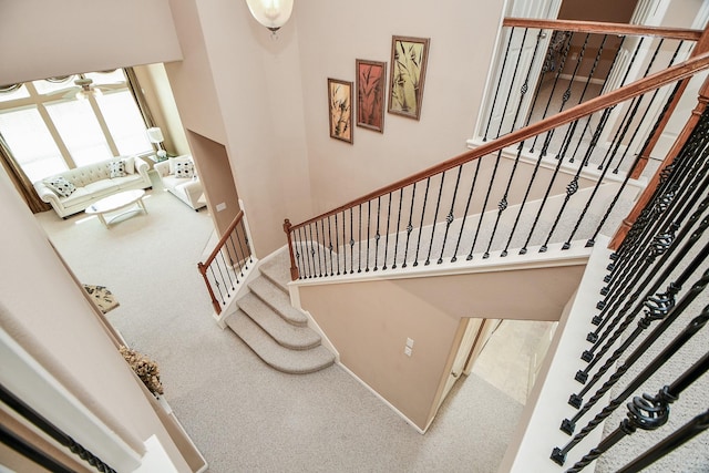 5823 Lundwood Ln, Houston, TX 77084 - stairs with carpet and baseboards